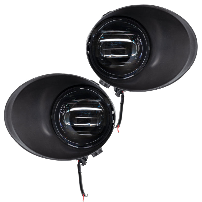 Pair of ORACLE Lighting high-powered LED fog lights for Toyota Tundra 2007-2013 with metal bumper, 6000K bright white illumination.