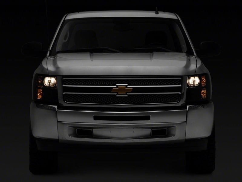 Raxiom 07-14 Chevrolet Silverado 1500 HD Axial OEM Rep Headlights- Chrome Housing- Smoked Lens