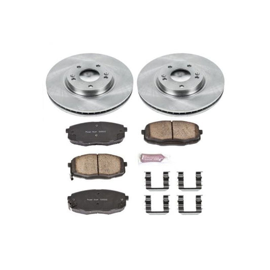 PowerStop OE brake kit for 2010-2013 Kia Forte front brakes, including rotors and pads, installed on vehicle.