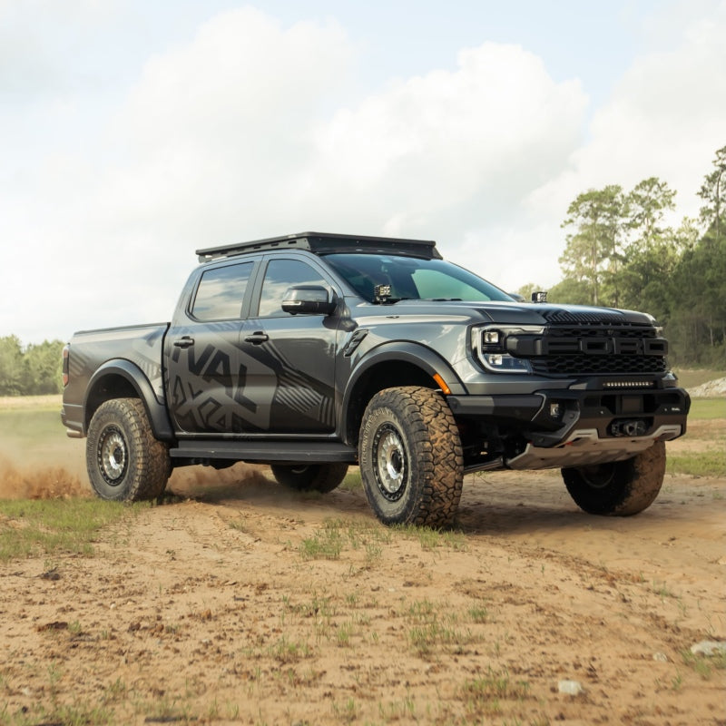 Rival 4x4 aluminum roof rack for Ford Ranger 24-26 and Ranger Raptor, mounted on vehicle for cargo storage.