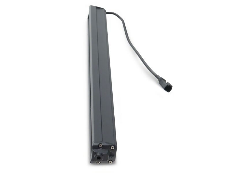 Raxiom 20-inch LED light bar with front bumper mounting bracket on a Toyota Tacoma, designed for off-road lighting.