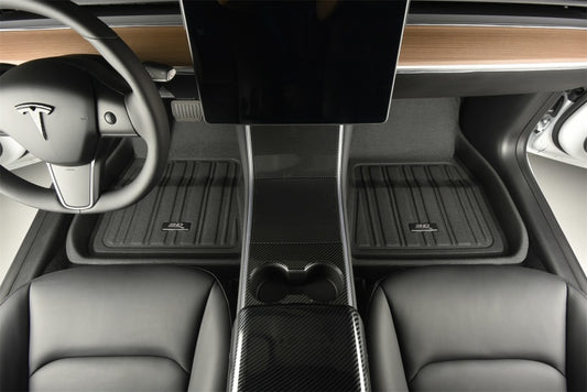 Black 3D MAXpider Tesla Model 3 Kagu first row rubber floor mat, textured surface, fits 2018-2019 Tesla Model 3 interior.