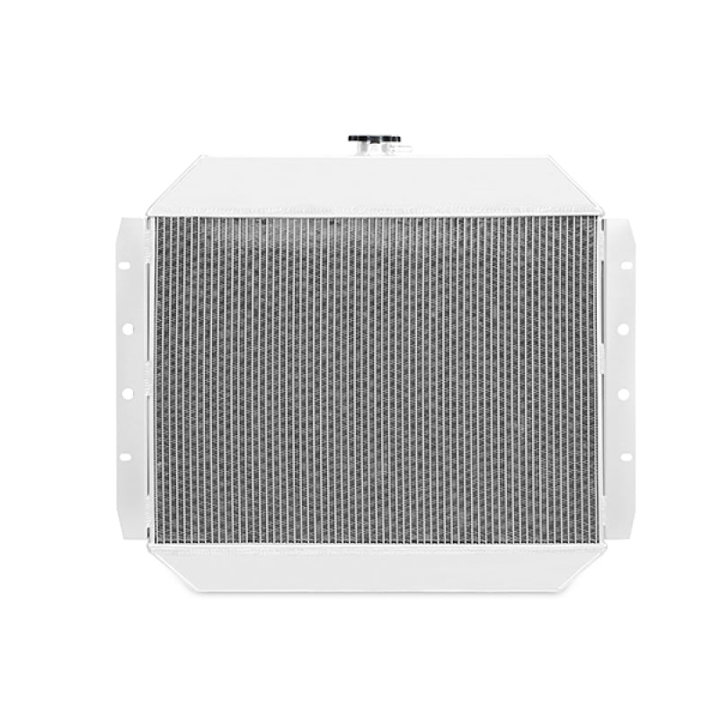 Mishimoto aluminum radiator for 1970-1979 Ford F-Series C/K X-Line trucks, showcasing a sleek silver finish and cooling fins.