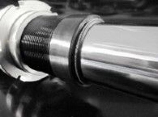 HKS Hipermax S coilover kit installed on a 2022+ Tesla Model Y AWD, showing the adjustable shock absorbers and suspension components.