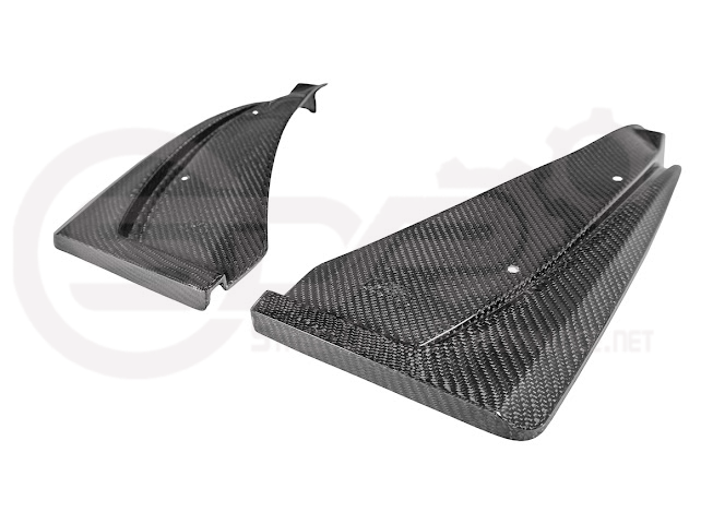Pair of black carbon fiber mud flaps for Cadillac CT5-V Blackwing from Street Driven Performance, protecting front and rear wheels.
