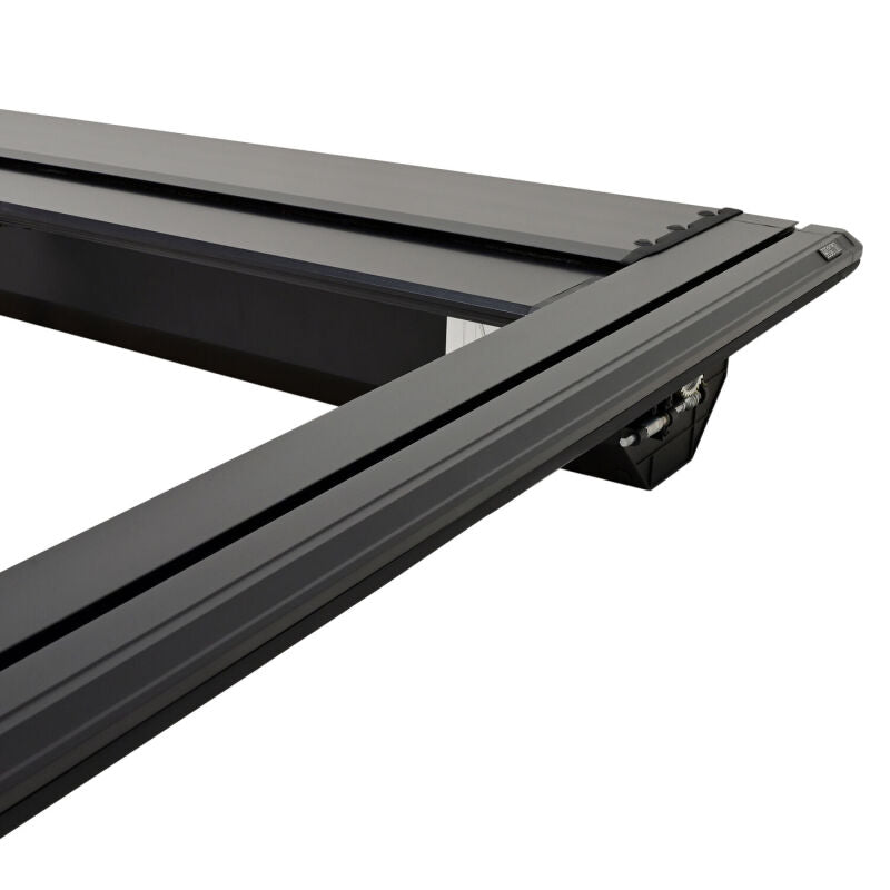 Westin manual retractable roll-up tonneau cover in black on a 22-26 Toyota Tundra 5.5ft bed, providing secure bed coverage.