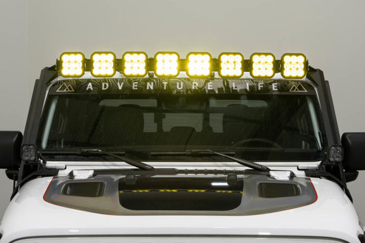 Diode Dynamics Jeep JL SS5 Pro CrossLink Yellow Combo Lightbar kit with LED light bar and mounting brackets for off-road vehicle illumination.