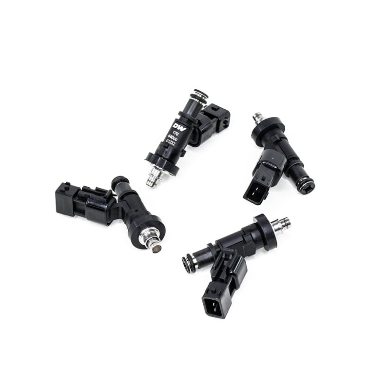 Set of four DeatschWerks fuel injectors for Honda S2000 F20/F22 440cc, designed for 4-cylinder engine performance.