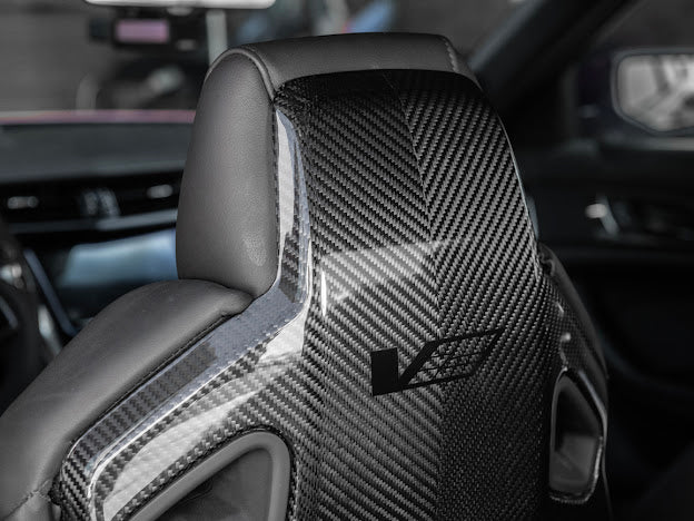 Recaro carbon fiber seat rear panel cover for 2016-2019 Cadillac ATS-V sedan, driver and passenger side, by Street Driven Performance.