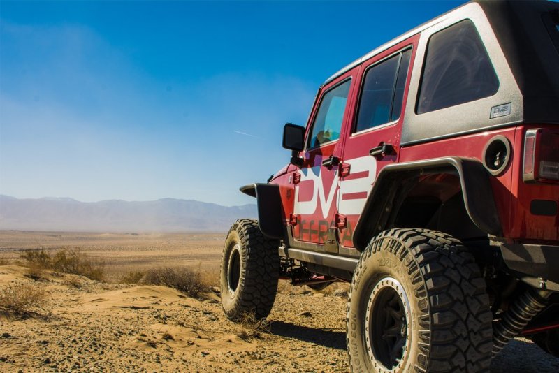 DV8 Offroad Jeep Wrangler JK front and rear flat tube fenders, durable black metal wheel arch protectors for off-road use