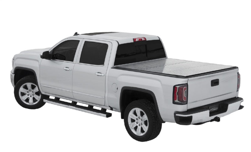 Access LOMAX Pro Series hard fold tonneau cover for 05-20 Nissan Frontier with 5ft bed in black diamond mist finish.