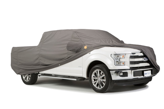 Covercraft Carhartt custom fit truck cover for Dodge Ram 1500 Crew Cab 2009-2023, in gravel color, designed for full vehicle protection.