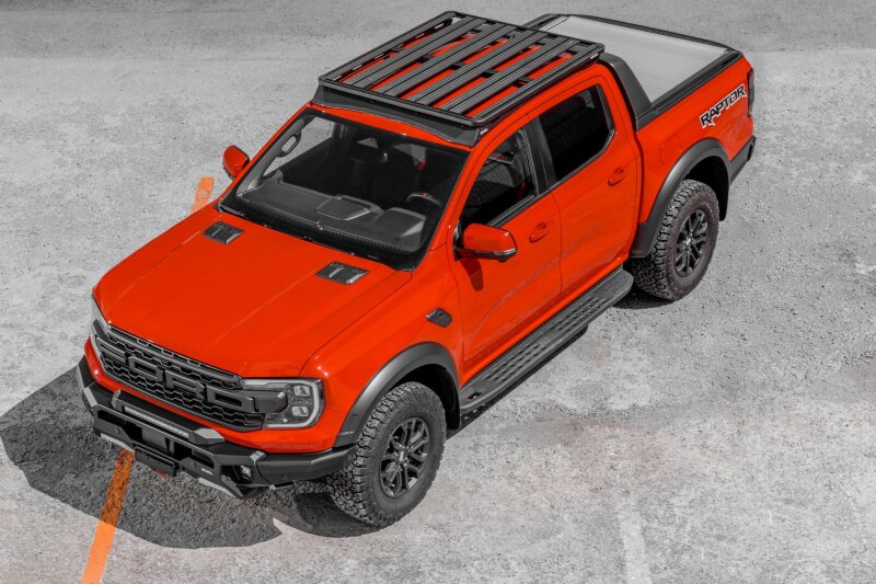 Rival 4x4 aluminum roof rack for Ford Ranger 24-26 and Ranger Raptor, mounted on top of the vehicle for cargo transport.