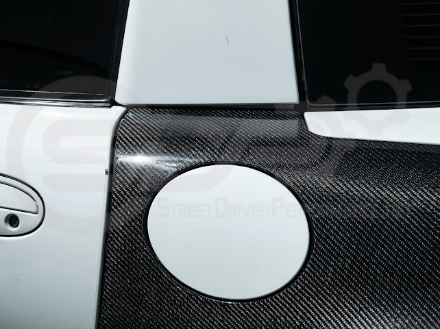 Factory style carbon fiber front and rear widebody fenders for 1997-2004 Chevrolet Corvette C5 hatchback by Street Driven Performance.