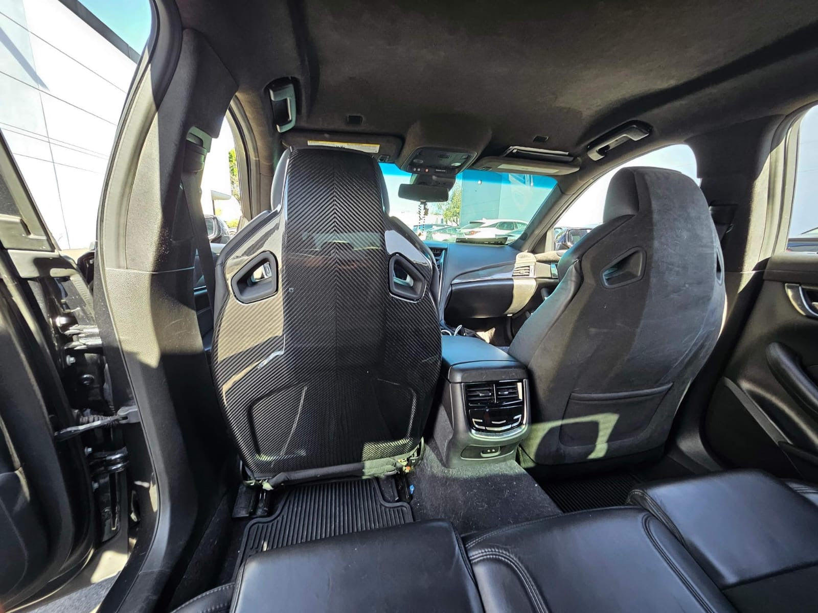 Cadillac ATS-V sedan Recaro carbon fiber seat rear panel cover replacement for driver and passenger seats by Street Driven Performance.