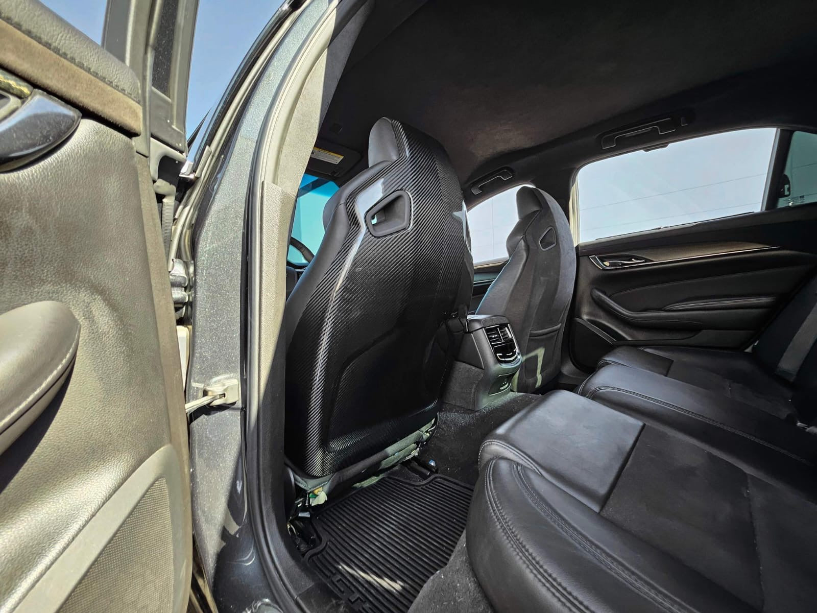 Cadillac ATS-V sedan Recaro carbon fiber seat rear panel covers for driver and passenger, by Street Driven Performance.