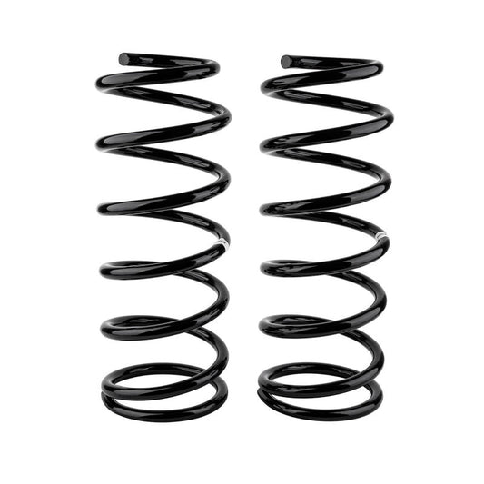 Old Man Emu ARB OME rear coil spring for 100 Series IFS, showing the coil spring's metal coil design and mounting ends.