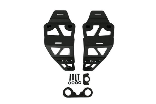 DV8 Offroad Jeep JL 392 and JT Mojave Edition dual pod light mounts installed on the vehicle's front grille area.
