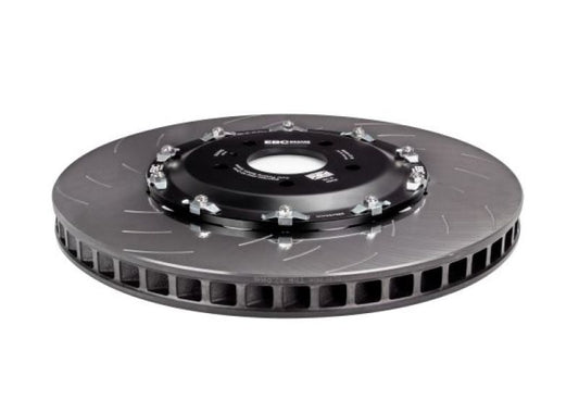 EBC Racing 2012+ Nissan GT-R R35 2-piece front brake rotors with vented design and silver finish, mounted on a vehicle.
