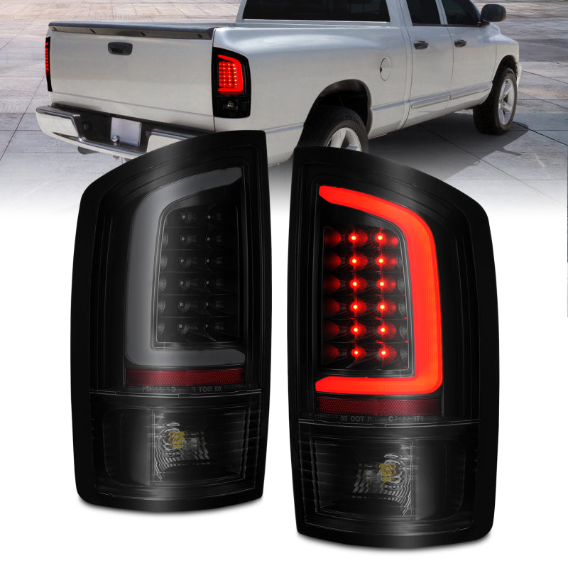 ANZO LED tail lights with smoke lens and light bar for Dodge Ram 1500 2002-2006, featuring black housing and modern design.