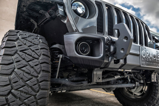 Oracle Lighting high performance green LED fog lights installed on Jeep Wrangler JL or Gladiator JT for enhanced visibility.