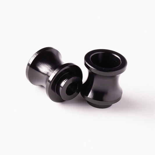 Black Vortex Racing Swingarm Spools for 8mm swingarms, designed for motorcycle rear axle protection and easy wheel removal.