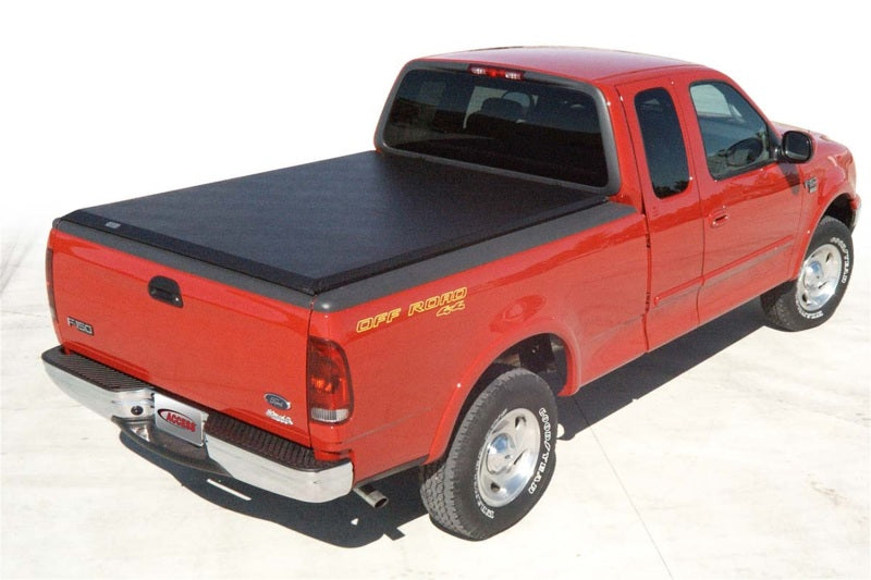 Access Limited roll-up truck bed cover installed on a 2004 Ford F-150 8ft bed, exterior truck bed accessory for enhanced protection.