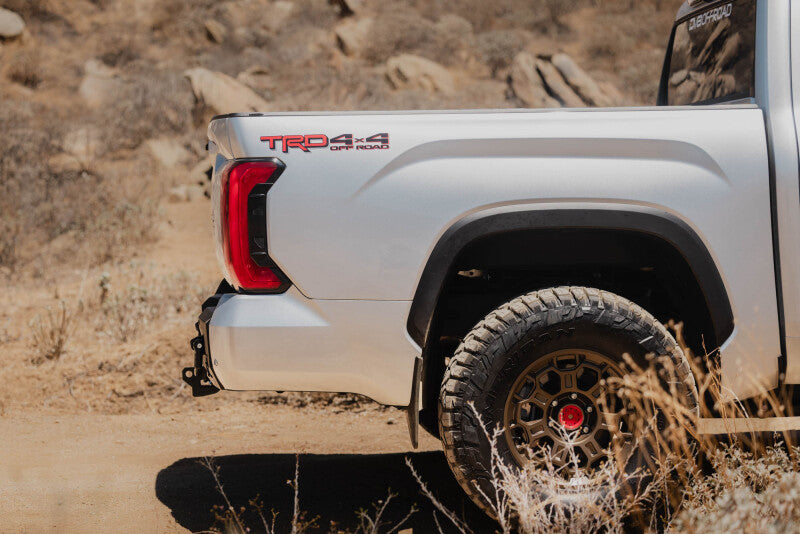 Steel rear bumper for Toyota Tundra from DV8 Offroad's Spec Series, designed for durability and off-road readiness.