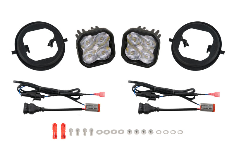Diode Dynamics SS3 LED fog light kit installed on a 2003-2006 GMC Sierra 1500/2500/3500, showing the bright Foxbeam fog lights.