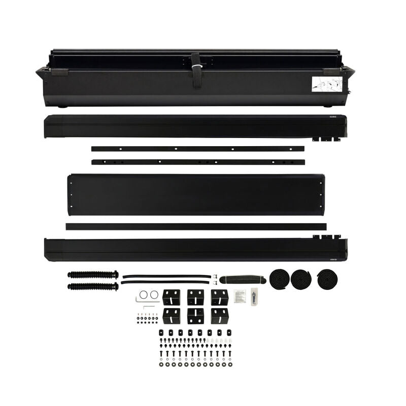 Westin manual retractable black tonneau cover on 22-26 Toyota Tundra with 5.5ft bed, roll-up style, durable truck bed protection.