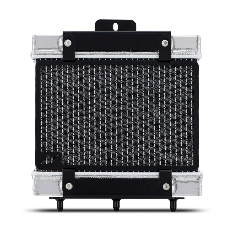 Mishimoto 15-20 BMW F8X M3 M4 performance auxiliary radiator showing aluminum core and fittings for optimal cooling.