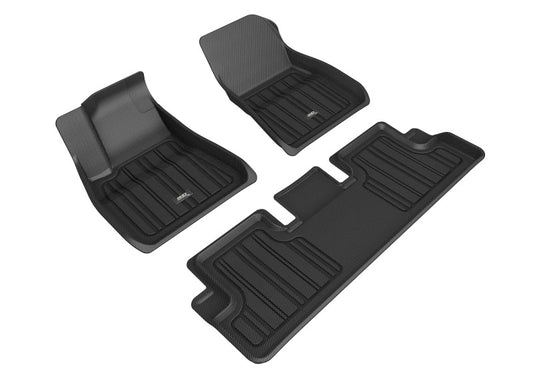 Black 3D MAXpider Tesla Model 3 Kagu 1st row rubber floor mat showing textured surface and fitted design for front seats.