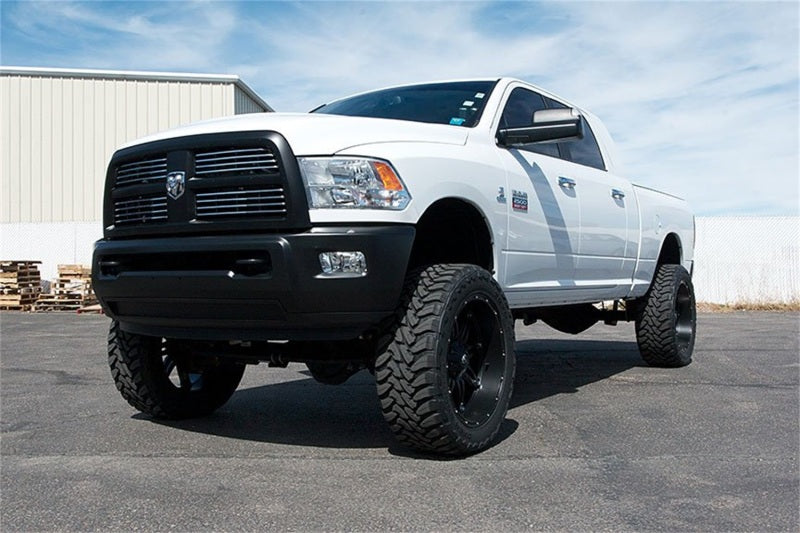 Tuff Country 6-inch lift kit for Dodge Ram 2500 4x4 with coil springs and SX8000 shocks, showing lifted truck suspension components.