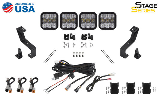 Diode Dynamics SS5 Grille CrossLink Lightbar Kit with yellow pro combo for 2019-present Ram trucks, featuring LED light bars and cubes.