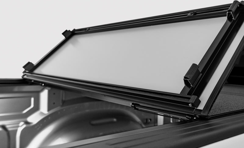 Access LOMAX Stance hard cover for Ram 1500/2500/3500 6ft 4in bed truck exterior accessory, weather-resistant and secure.