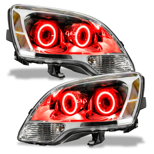 Oracle Lighting red LED halo headlights for 2008-2012 GMC Acadia, pre-assembled non-HID headlight upgrade, with halo rings visible.