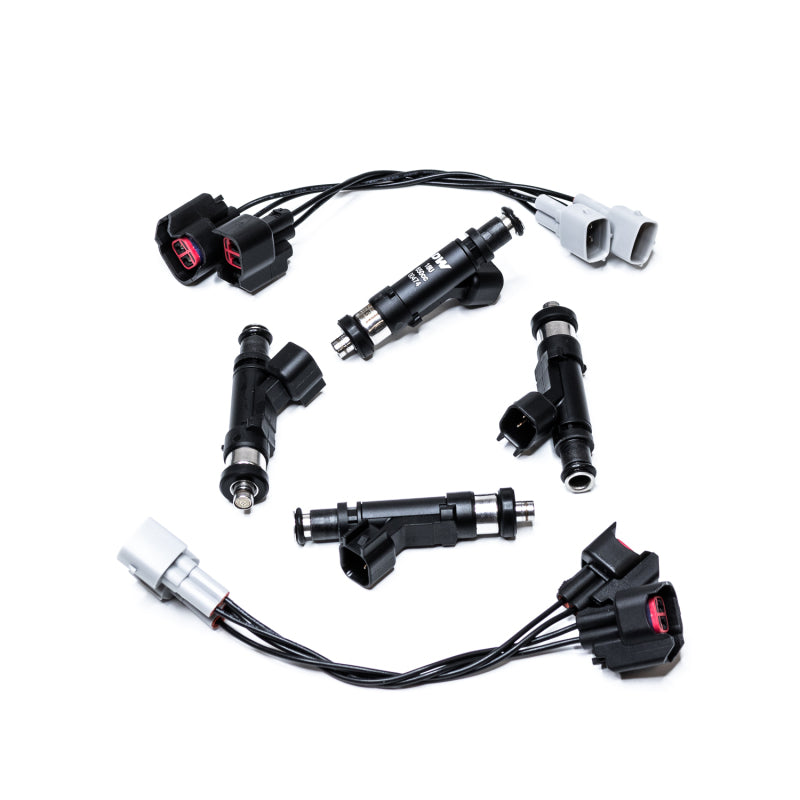 DeatschWerks 650CC fuel injector set for 4-cylinder engines, compatible with Toyota Celica, MR2, tC, xA, and Elise 1.8L models.