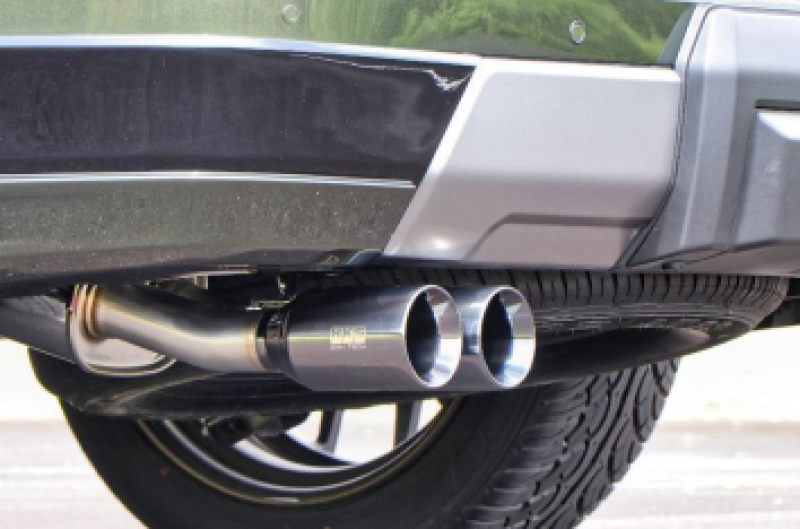 HKS Legamax Trail Master catback exhaust system installed on a Lexus GX550, featuring a sleek metal finish and dual exhaust tips