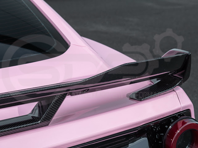 Dark Horse style carbon fiber rear wickerbill spoiler wing on a 2015-2023 Ford Mustang, featuring sleek aerodynamic design.