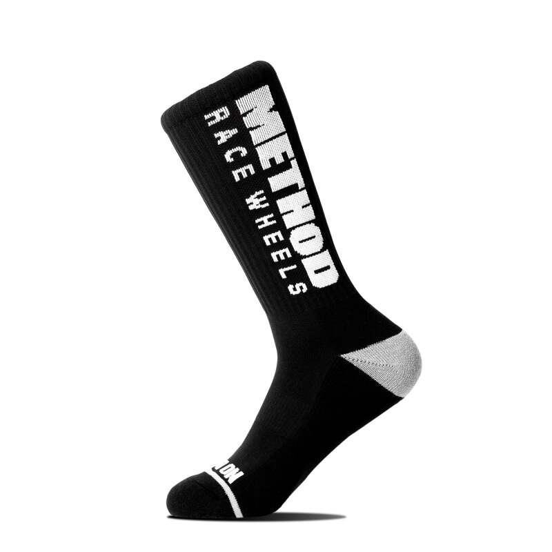 Black Method Wheels logo performance socks featuring the Method brand logo, designed for comfort and athletic wear.