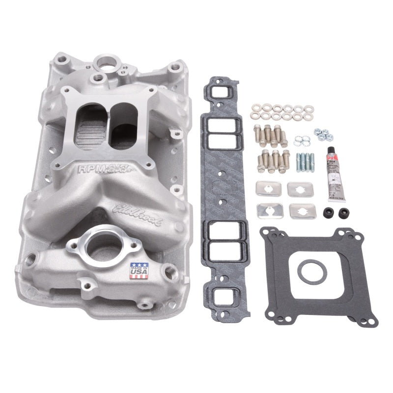 Edelbrock Performer RPM Air-Gap intake manifold installation kit for SBC engines, natural finish, includes gaskets and mounting hardware.