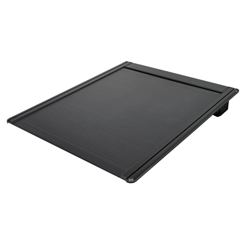 Westin black retractable tonneau cover on Ford F-250/F-350 SD 6.8ft bed, showing sleek design and secure locking mechanism.