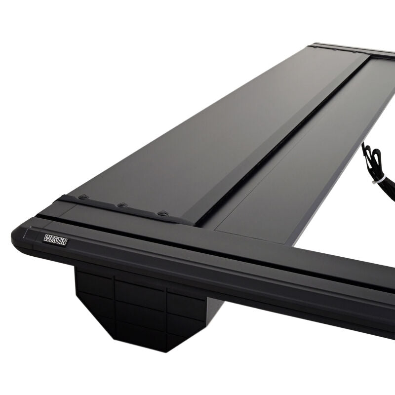 Westin black roll-up tonneau cover for Ford F-250, F-350, F-450, F-550 6ft 10in bed, manual retractable truck bed cover