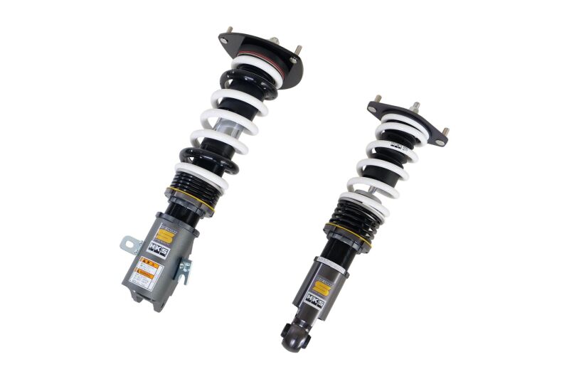 HKS HIPERMAX S coilover kit installed on a Subaru WRX STI, showcasing adjustable suspension components and sleek design