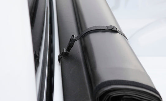Access 2019+ Ram 1500 6ft 4in bed roll-up cover with multi tailgate, featuring a sleek, durable black roll-up design.