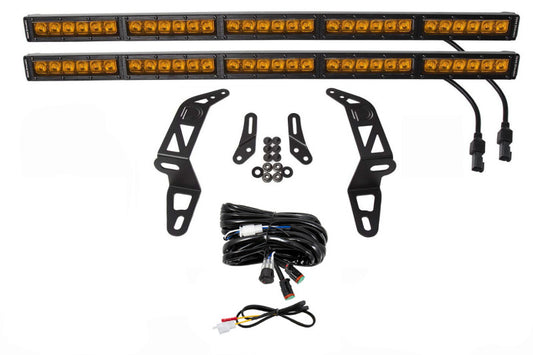 Diode Dynamics amber dual driving light bar with Jeep JL Wrangler/Gladiator SS30 bumper bracket kit, mounted on front vehicle.