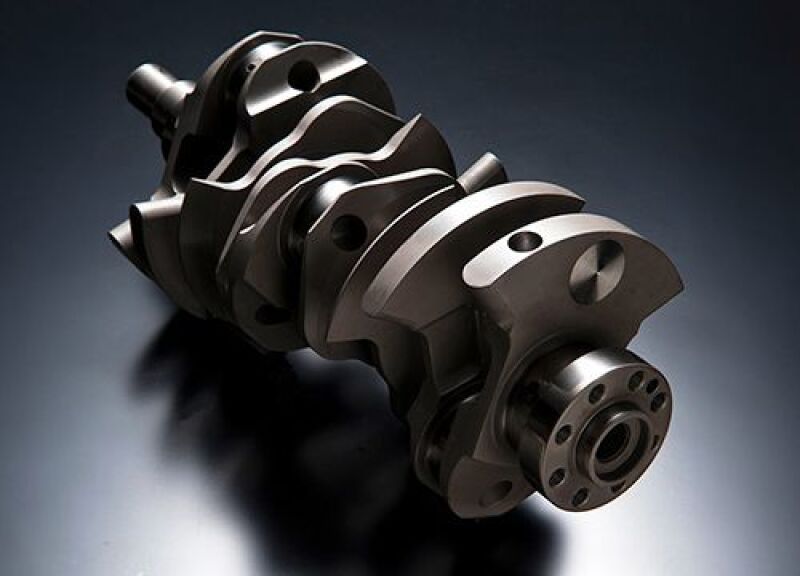 HKS VR38 4.3L STEP Pro crankshaft for high-performance engine, detailed view of the precision-machined crankshaft component.