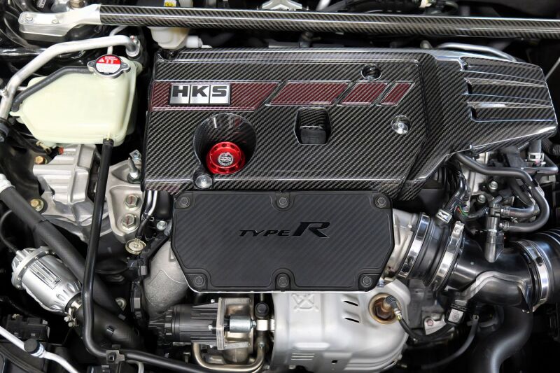 HKS Honda Civic Type R (FL5/FK8) dry carbon fiber engine cover showing a sleek, lightweight protective engine component.
