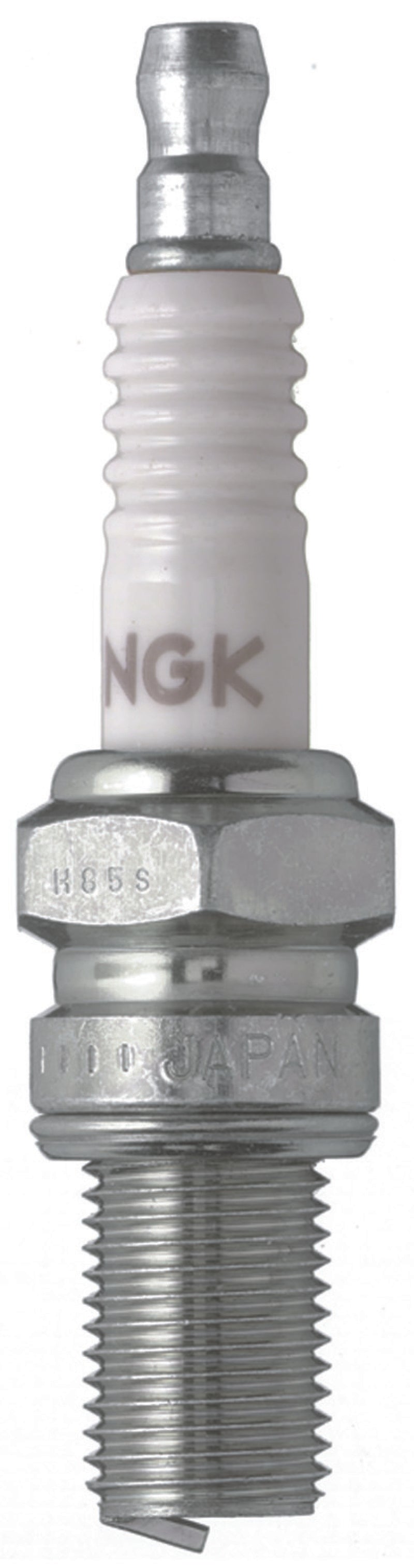 NGK Racing Spark Plugs box of 4 with four spark plugs, featuring black ceramic insulators and metal connectors, for high-performance engines.