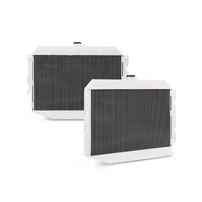 Mishimoto small block aluminum radiator for 70-73 Plymouth Barracuda, X-Line design, with fins and mounting points visible.